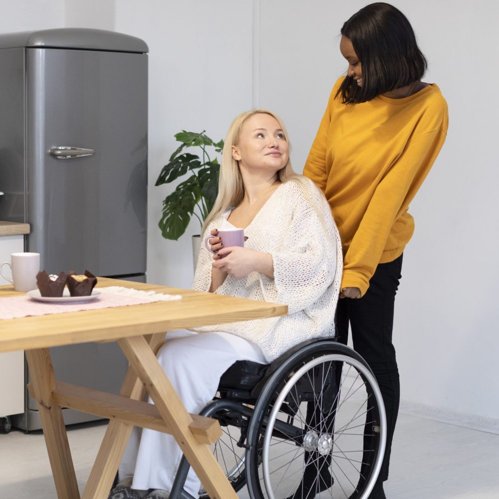 full-shot-smiley-woman-wheelchair